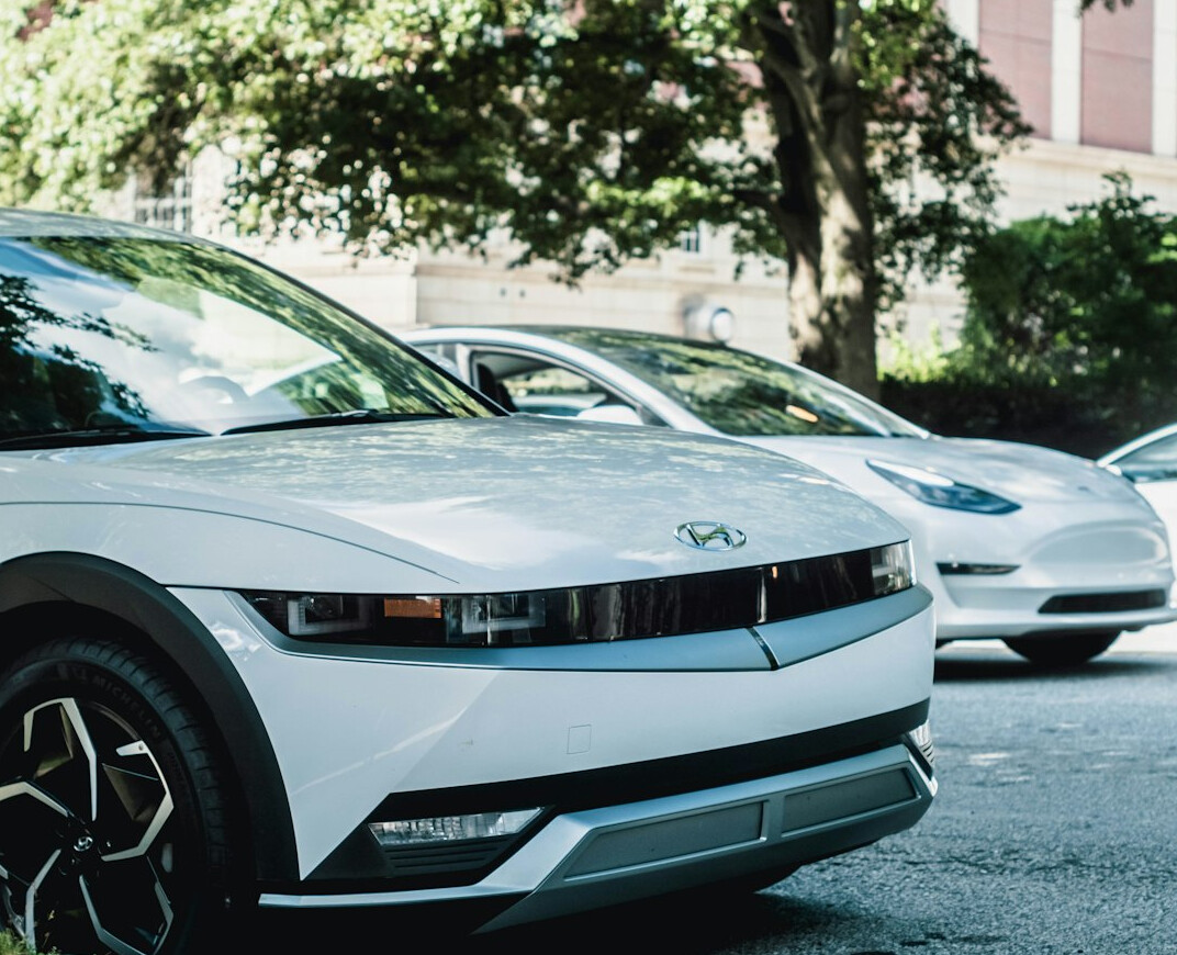 group of electric cars parked