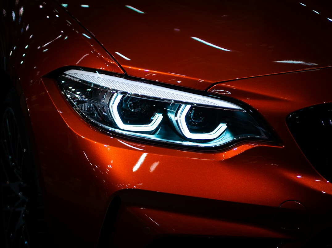 Close up of a luxury car headlight at night